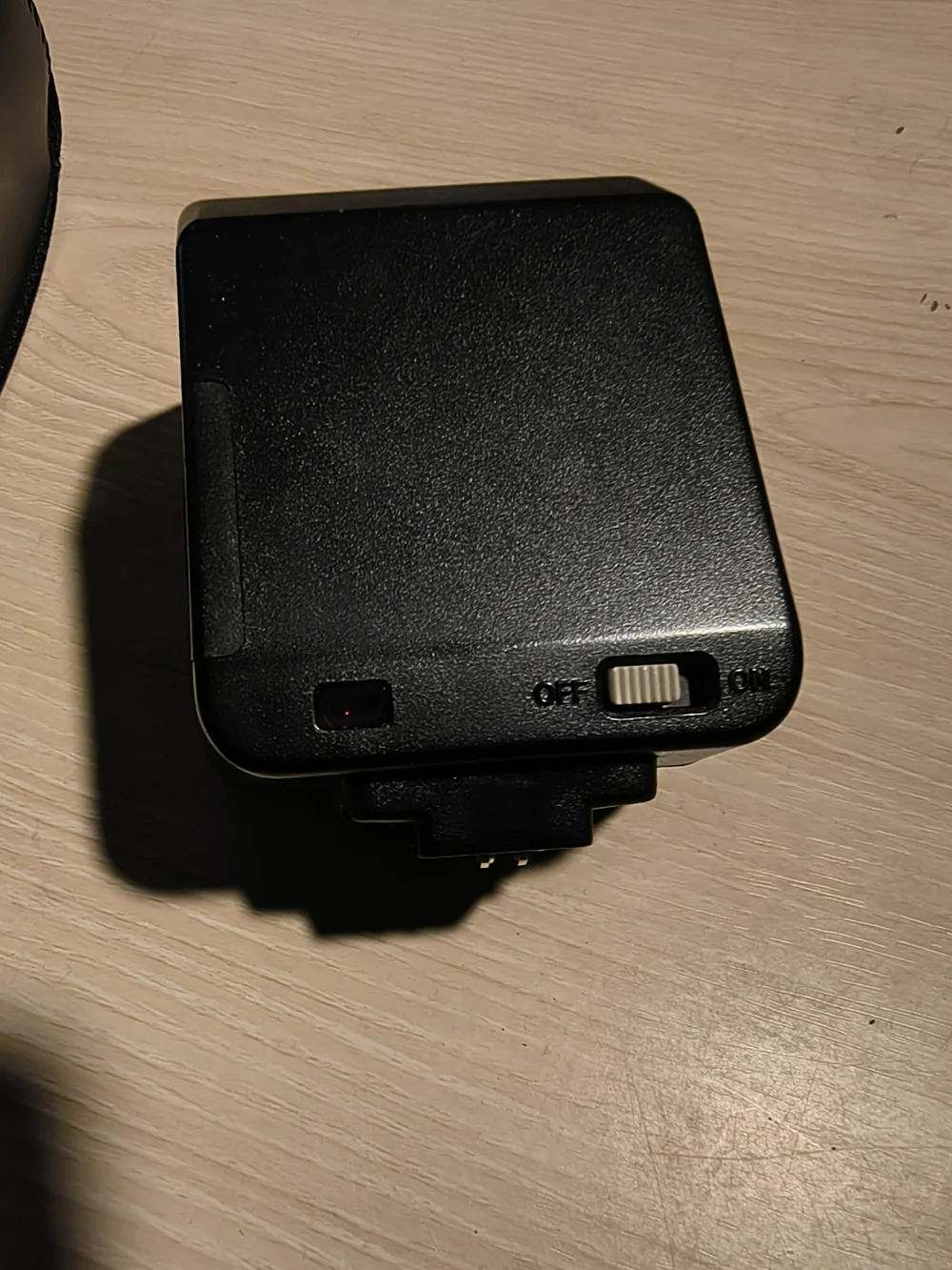 vintage Canon Speedlite 244T electronic flash unit with its leather case,
